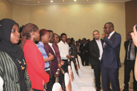 Minister Kazako talks to students.jpg